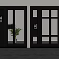 Modern Black Doors With Glass Panels And Access Control Device Nearby Potted Plant