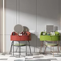 Red and Green Dressing Tables With Mirrors Stools and Decorative Items on Gray Wall Background