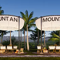 Outdoor Mountain Themed Tents With Palm Trees And Scenic Mountain View Setup