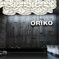 Oriko Hotel Lobby Featuring Modern Textured Wall And Grand Chandelier Design