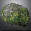 Natural Wood Stone Featuring Green Yellow Hues And Textured Surface Design