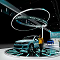 HAVAL Exhibition Booth With Modern Illuminated Design Displayed Cars And Visitors