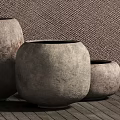 Natural Textured Ceramic Vessels In Various Sizes With Woven Wall And Wooden Floor