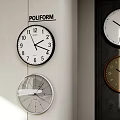 Multiple Modern Wall Clocks With Different Color Frames And Design Styles