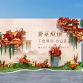 Elegant Floral Display for Welcome Event with Red Orange Blooms Greenery and Backdrop
