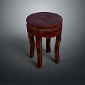 Red Wooden Stool With Round Top And Four Elegant Carved Legs