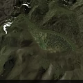 Lush Green Rolling Mountainous Garden Landscape With Natural Terrain And Blue Sky