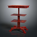 Ornate Red Three Tiered Storage Shelf With Decorative Patterns And Curved Legs