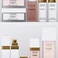Elegant Chanel Coco Perfume And Cosmetics Collection On White Shelf