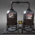 Industrial Metal Storage Tanks With Hazardous Materials Labels And Warning Signs