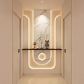 Modern Foyer Hallway With Warm Lighting Marble Wall And Decor