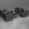 Modern Black Leather Sofa And Coffee Table Combination With Metal Legs Glass Top And Flower Vase