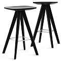 Modern Black Bar Stools With Tripod Legs And Metal Footrests Design