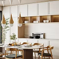 Modern Dining Table Set with Wooden Chairs Pendant Lights Plants and White Cabinets