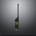 Green Walkie Talkie With Long Antenna And Control Buttons On Dark Background