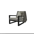 Modern Single Sofa With Black Wooden Frame Light Beige Fabric Cushion And Draped Blanket