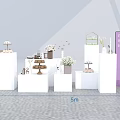 Modern Exhibition Booth Design With White Display Tables Product Racks Green Plants And Signage