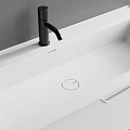 Modern Bathroom Interior With White Sink Round Mirror And Black Faucet