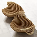 Modern Sculptural Public Chair With Wooden Wavy Striped Design And Curved Structure