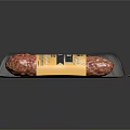 Traditional Italian Salami in Transparent Vacuum Sealed Packaging with Yellow Label
