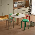 Modern Simple Kitchen Corner With Round Table And Colorful Green Red Beige Stools 3d model