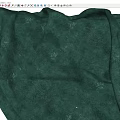 Elegant Green Velvet Fabric Showcasing Natural Wrinkles And Smooth Textured Surface