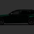 Dark Green Sporty Station Wagon With Sleek Body Design And Stylish Alloy Wheels