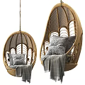 Wicker Hanging Chair With Intricate Pattern Cozy Pillows And Plaid Blanket For Home Interior