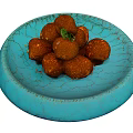 Red Round Snacks on Blue Cracked Plate with Green Decorative Leaf