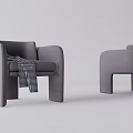 Gray Single Seater Sofa with Black White Plaid Blanket and Matching Ottoman in Modern Minimalist Space