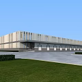Modern Industrial Factory Building With Light Colored Exterior Large Windows Front Plaza Green Lawn Hedges