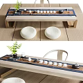 Japanese Style Wooden Tea Table With Chairs Floor Cushions Tea Set And Green Plant