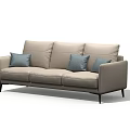 Modern Minimalist Three Seater Sofa With Light Beige Upholstery Blue Cushions And Black Legs