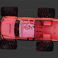 Rugged Off Road Terrain Featuring Red Toy Monster Truck With Large Tires