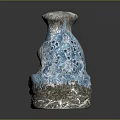 Intricate Blue And Gray Stone Sculpture Carving With Hollow Center Decorative Patterns