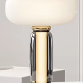 Modern Table Lamps With White Lampshades Gold Accents Transparent Black Bases On White Tabletop