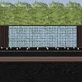 Blue Mosaic Tile Feature Wall With Front Fountains And Green Trees Background