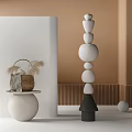 Stacked Carved White Stone Sculpture With Black Conical Base In Modern Interior