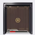 Dark Wooden Front Gate With Golden Circular Emblem Rivets And Black Frame