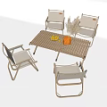 Outdoor Wooden Table with Four Chairs Fresh Fruits Orange Basket and Pampas Grass