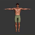 Man in green shorts and sandals with arms outstretched on gray background