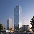 Tall modern office building featuring glass facade with surrounding buildings and trees under sunset sky