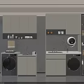Modern Laundry Room Featuring Two Black Washing Machines White Cabinets And Gray Walls