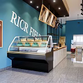 Dessert Shop Interior With Blue Walls Display Case Desserts And Coffee Elements 3d model