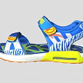 Blue Sandals With White Pattern And Velcro Straps Yellow Green Sole For Comfortable Wear