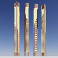Modern Outdoor Column Lights With Textured Patterns And Illuminated Glow At Night
