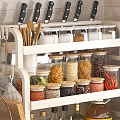 Kitchen Storage Rack With Spices Grains Jars And Knives For Organized Countertop