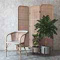 Rattan Leisure Chair with Woven Armrest and Backrest near Rattan Screen and Green Plants in Modern Indoor Space