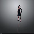 Woman In Black One Shoulder Dress With Belt And Black Shoes On Gray Background