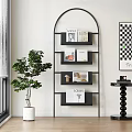 Black Curved Display Shelving In Modern Interior With Books Plants And Decor